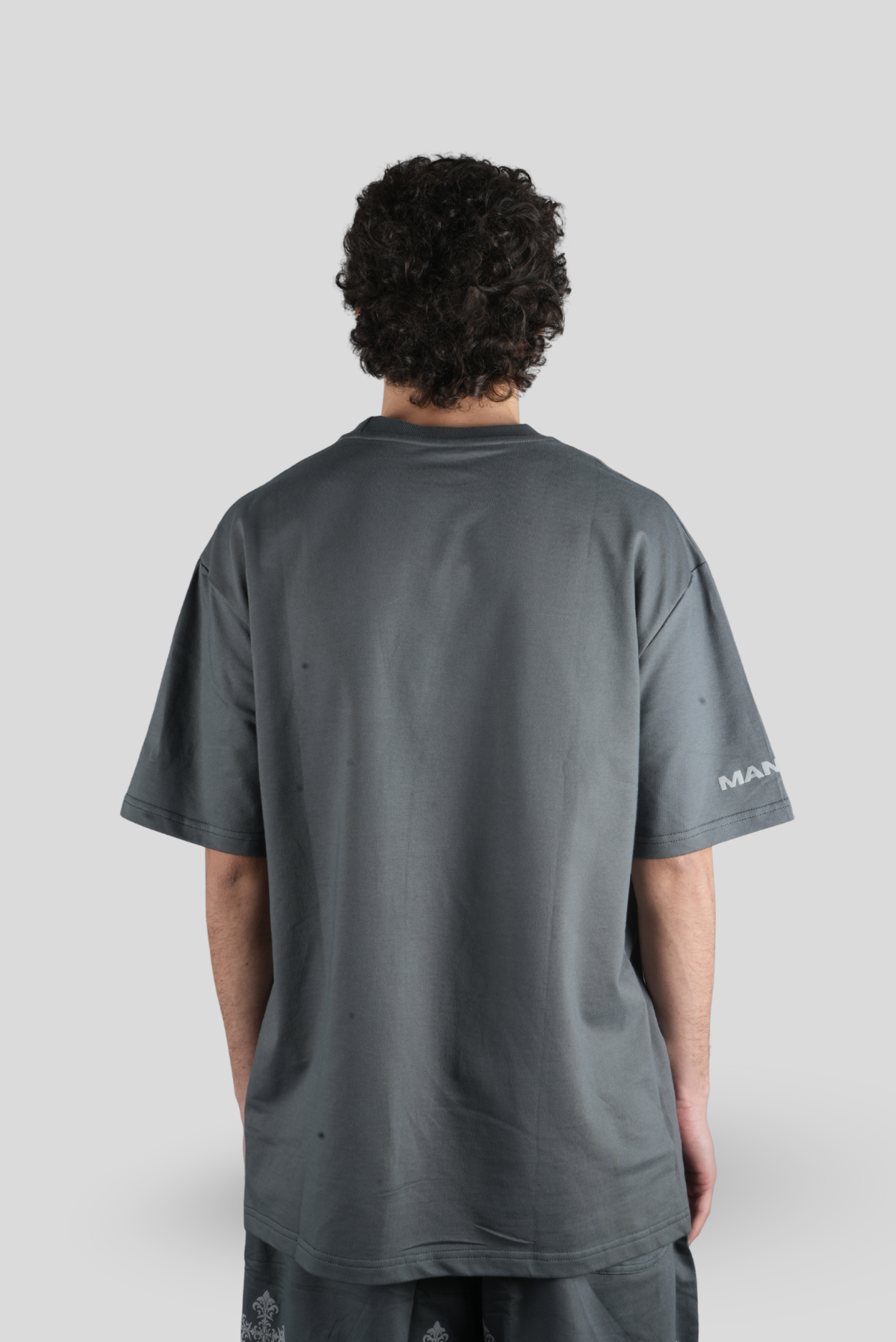 CRISS- CROSS TEE