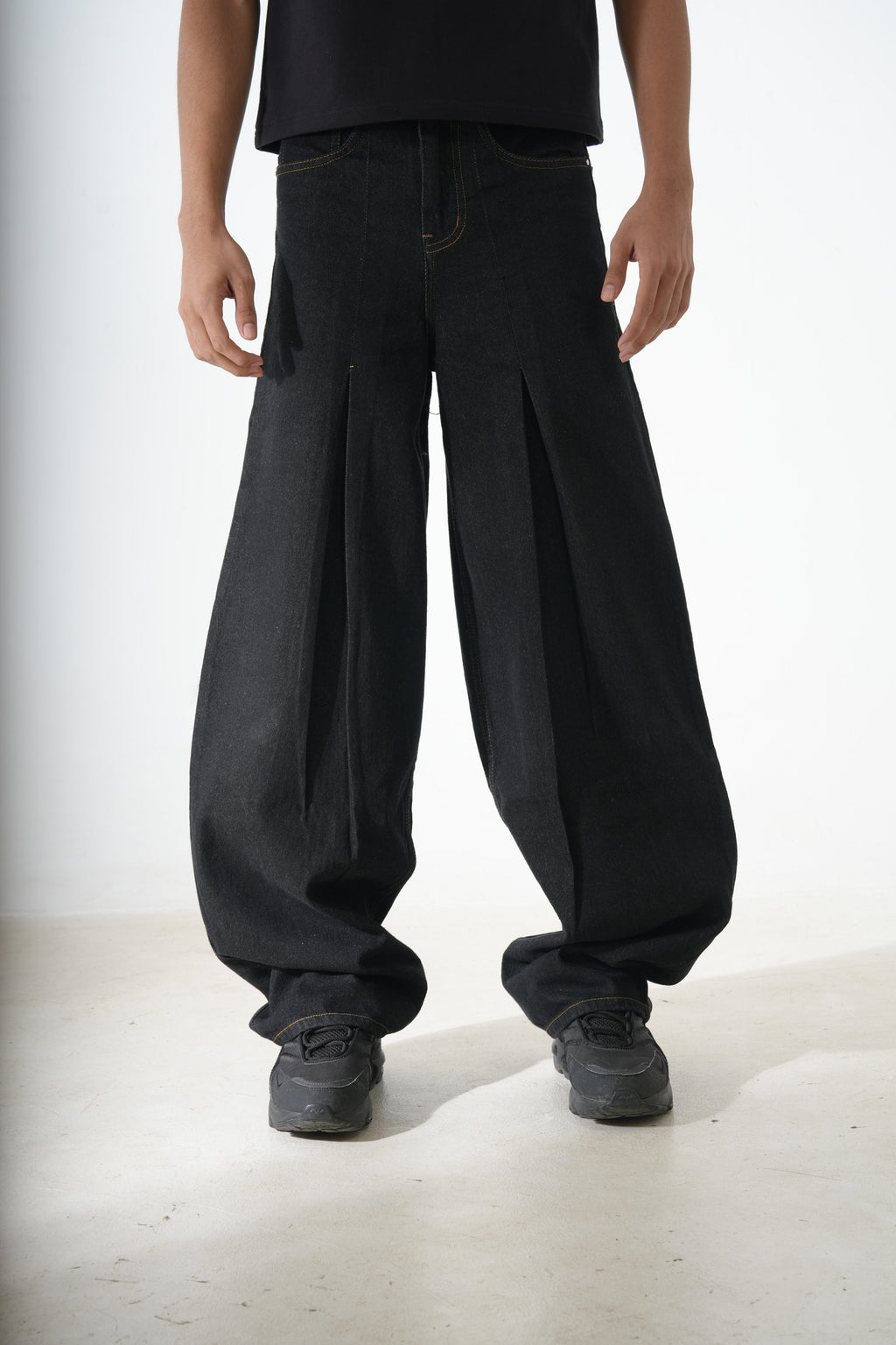 Black pleated denim