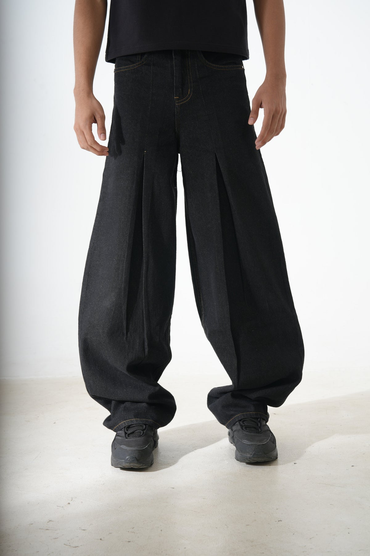 Black pleated denim