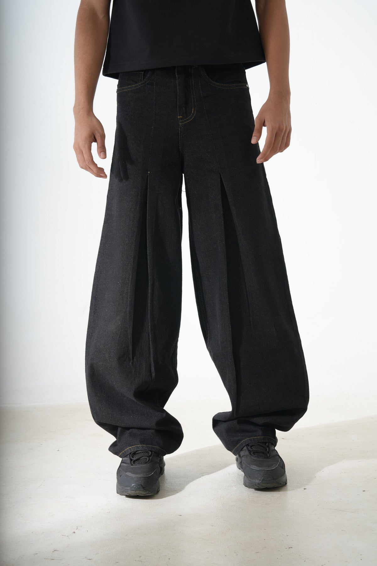 Black pleated denim