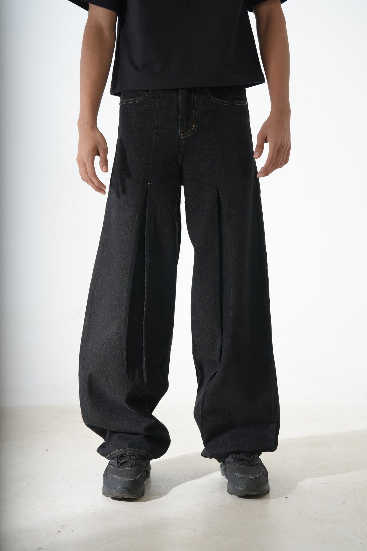 Black pleated denim