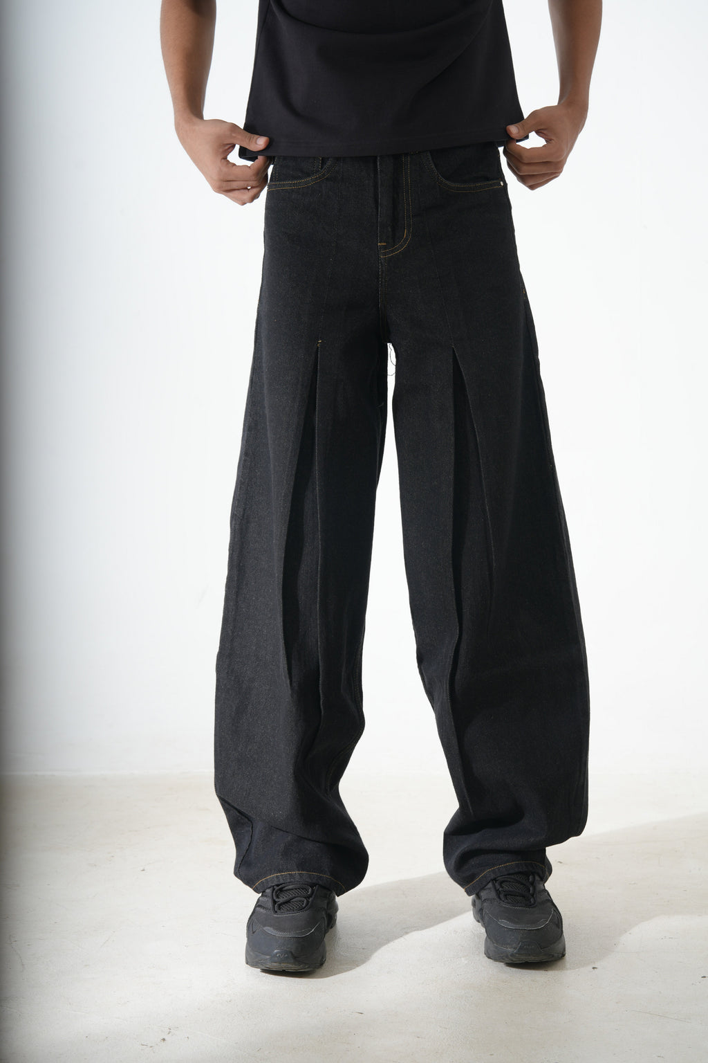 Black pleated denim