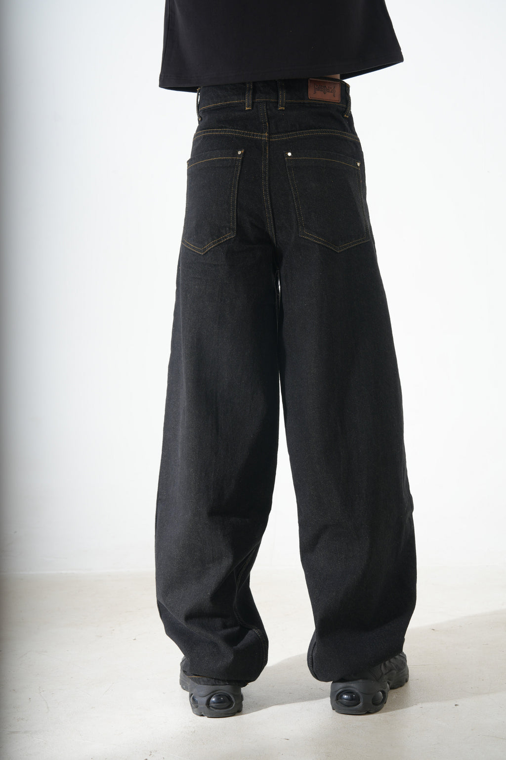 Black pleated denim